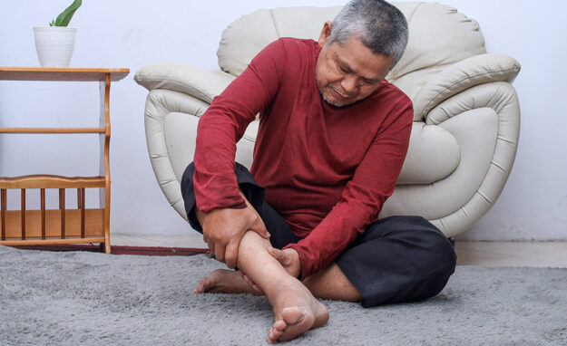 Senior,Man,Sitting,On,Floor,Have,Cramps,In,His,Calves, varicose veins